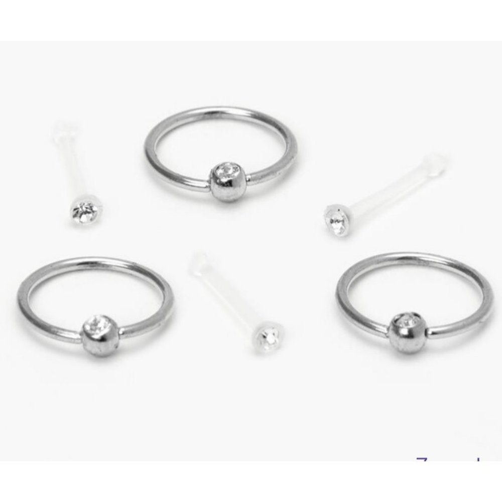 New set of 6 stainless steel Crystal nose rings and retainers